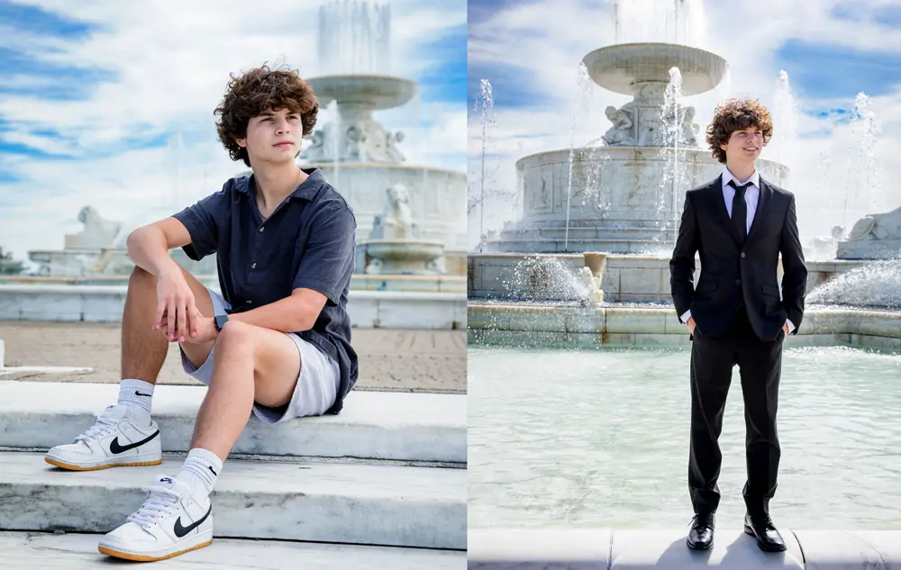 Two images side by side of a high school senior for his Detroit senior pictures session on Belle Isle in Downtown Detroit, MI. Left: A person with curly hair, wearing a navy shirt, light shorts, and white sneakers, sits on a fountain ledge. Right: The same person stands near the fountain, dressed in a black suit and tie, hands in pockets.