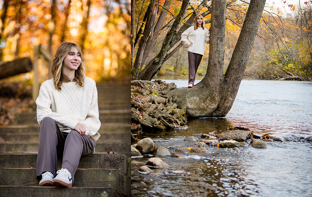 A high school senior girl with light brown hair wearing a cream sweater and gray pants poses for Fall Senior Pictures in Ann Arbor, sitting on outdoor steps and standing by a river, surrounded by colorful autumn foliage.