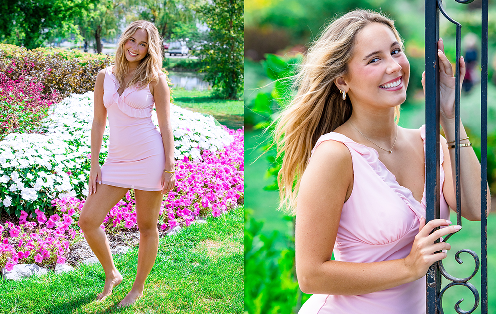 A high school senior girl in a light pink dress poses barefoot in a garden full of colorful flowers during her summer senior pictures session. In one photo, she stands smiling among the blooms; in the other, she smiles while holding a black iron gate.