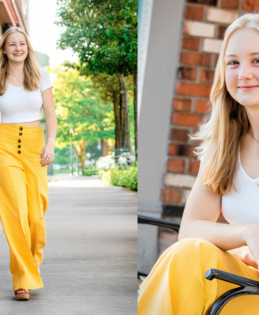 Dexter High School senior with long blonde hair in a white top and yellow pants, smiling as she walks and sits outdoors for her senior pictures session with award winning photographer, Paul Manoian