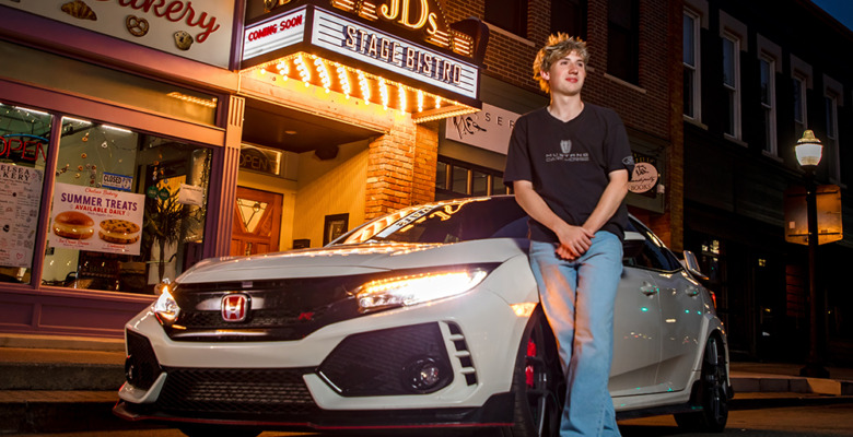 Chelsea senior pictures featuring a Honda Civic Type R in front of the new JD's Stage Bistro marquee in downtown Chelsea, Michigan.
