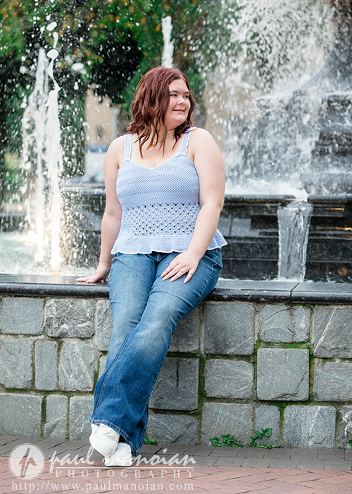 Class of 2027 senior portrait at the fountain in downtown Plymouth Michigan