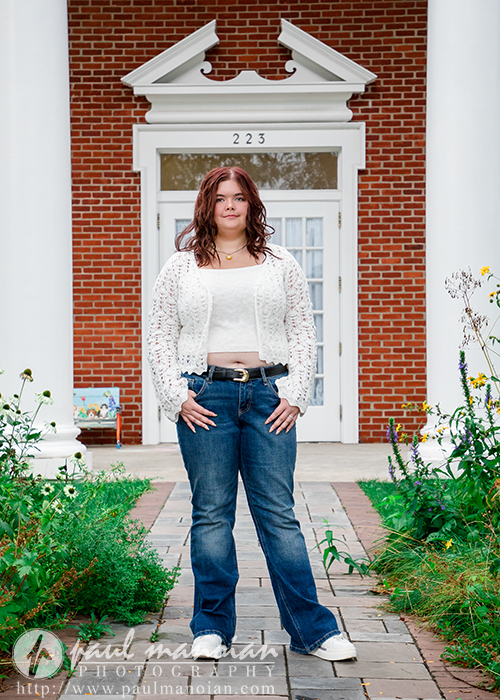 Franklin High School senior photographed among historic architecture in Plymouth