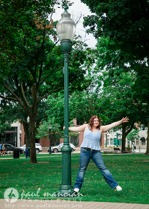 Lena during her senior picture session in a downtown Plymouth park