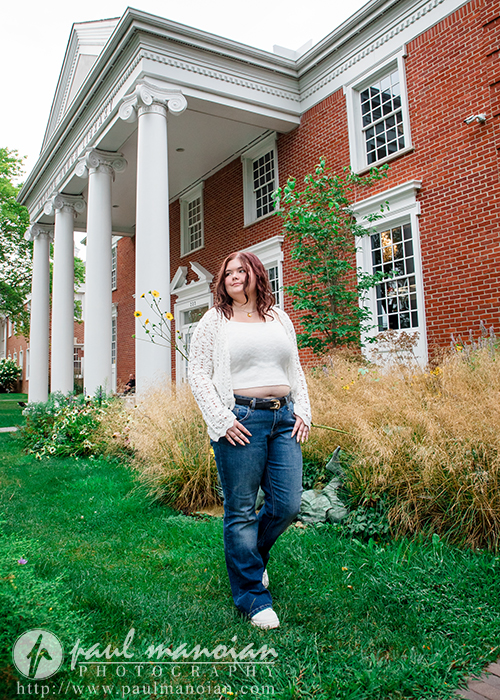 Class of 2027 senior pictures outside a historic building in downtown Plymouth