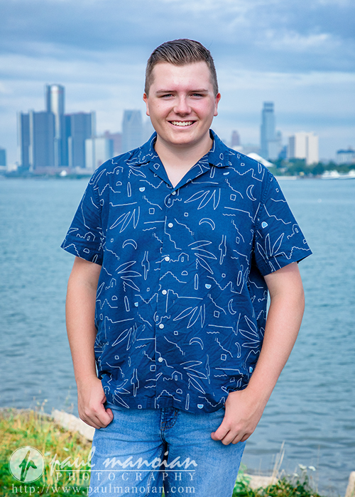 Swartz Creek senior portrait with the downtown Detroit skyline from Belle Isle
