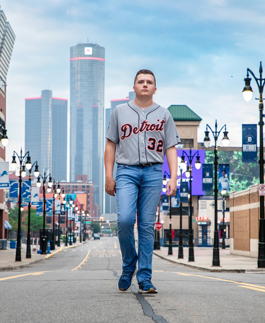 Swartz Creek senior wearing a Detroit Tigers jersey for senior pictures in downtown Detroit