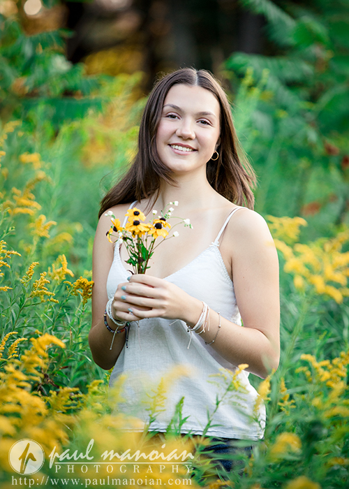 Senior pictures in a flower field at Nichols Arboretum in Ann Arbor