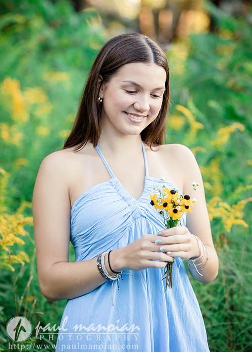 Senior portrait with wildflowers at Nichols Arboretum