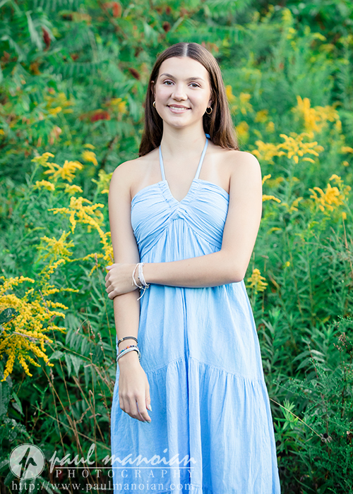 Senior pictures with yellow flowers in Ann Arbor Michigan