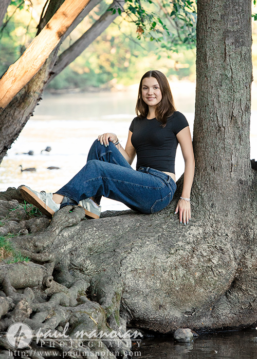 Natural senior portrait beside the Huron River