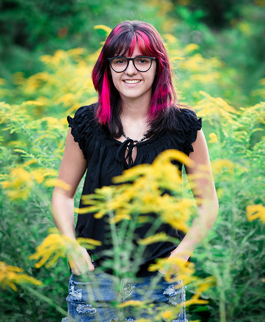 Skyline High School Senior Pictures in a Flower Field