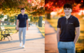 A young man with curly hair and a navy shirt walks on a park path lined with autumn trees and benches; in a close-up from his fall senior pictures session, he smiles with hands in his pockets, sunlight illuminating the colorful foliage behind him.