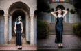 A woman with long dark hair wearing a black satin dress poses in front of an arched stone structure in one image and on a brick path with greenery and stairs in the background in the other image.